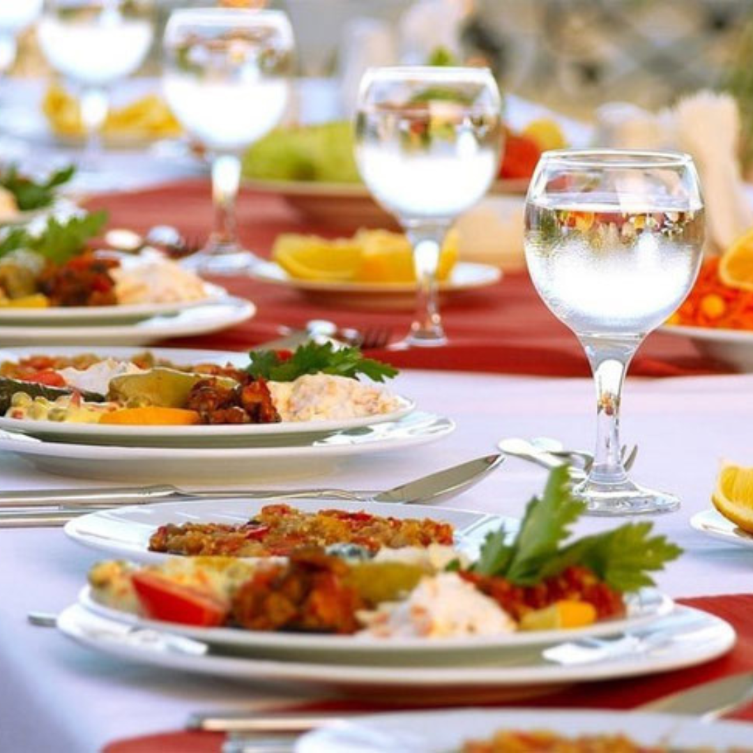 Plate of Food With Glasses of Water - Bikaner Bites