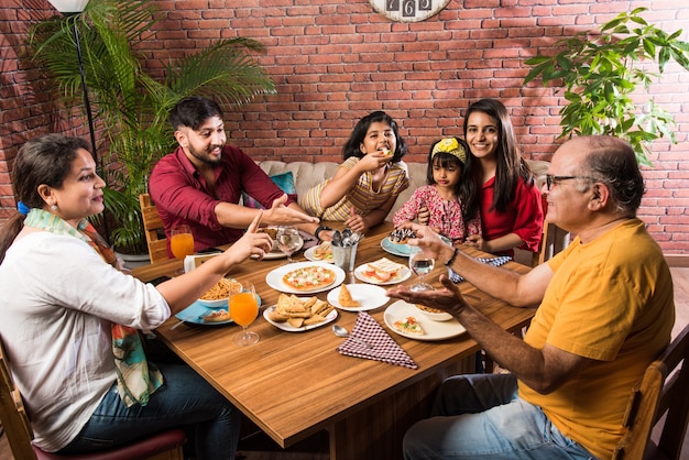 Indian Family Eating Food Restaurant - Bikaner Bites